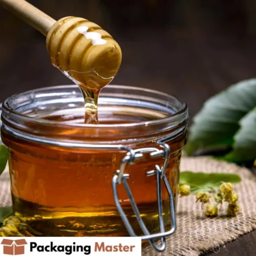 Wooden honey dipper stick used for serving honey from jar in kitchens, cafes and food packaging use in Pakistan