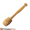 Wooden honey dipper stick in Pakistan for serving honey in jars, natural kitchen and food use Wooden honey dipper stick in Pakistan for serving honey in jars, natural kitchen and food use